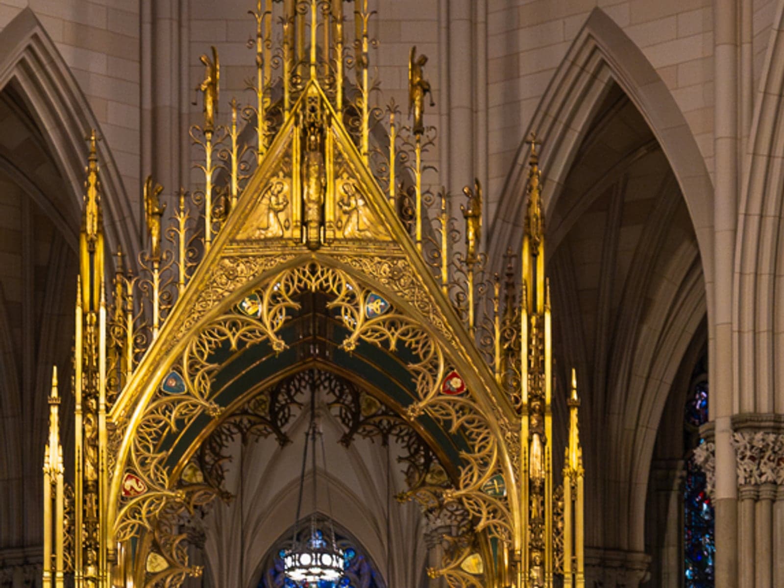 Gothic tracery and arches inside a cathedral